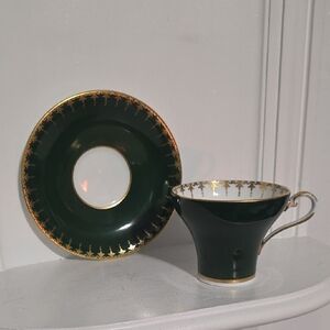 This is a vintage Aynsley fine bone china teacup & saucer in a forest green.